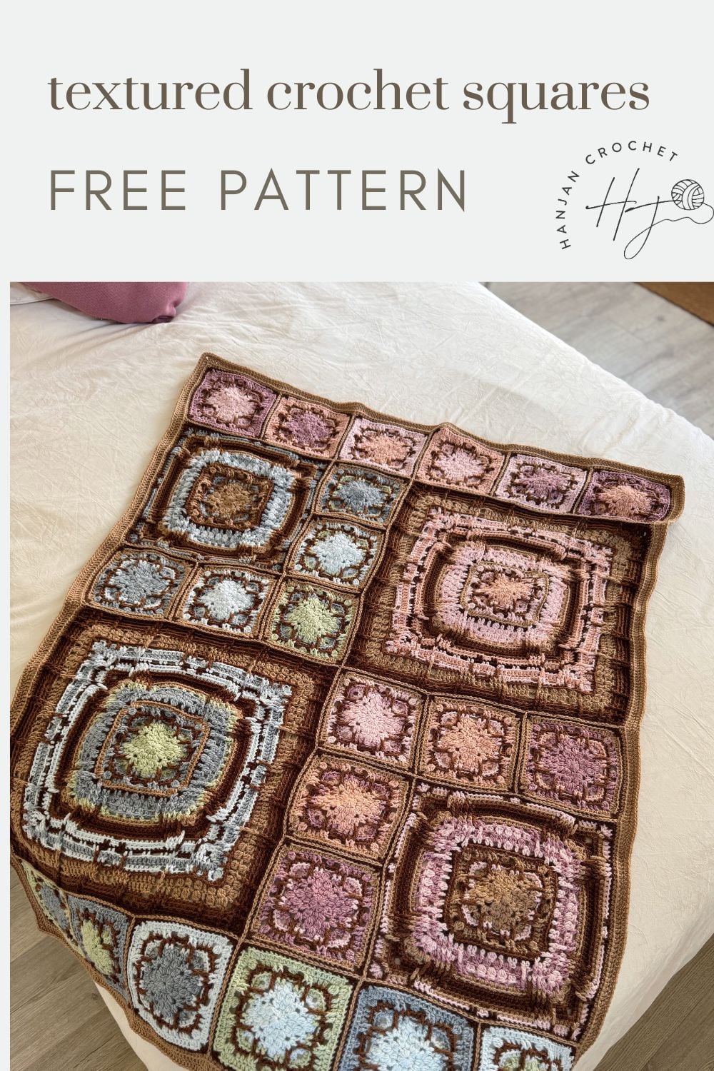 A beautiful crochet blanket featuring textured squares in brown, pink, blue, and cream lies on a bed. Text above reads "textured crochet squares FREE PATTERN.