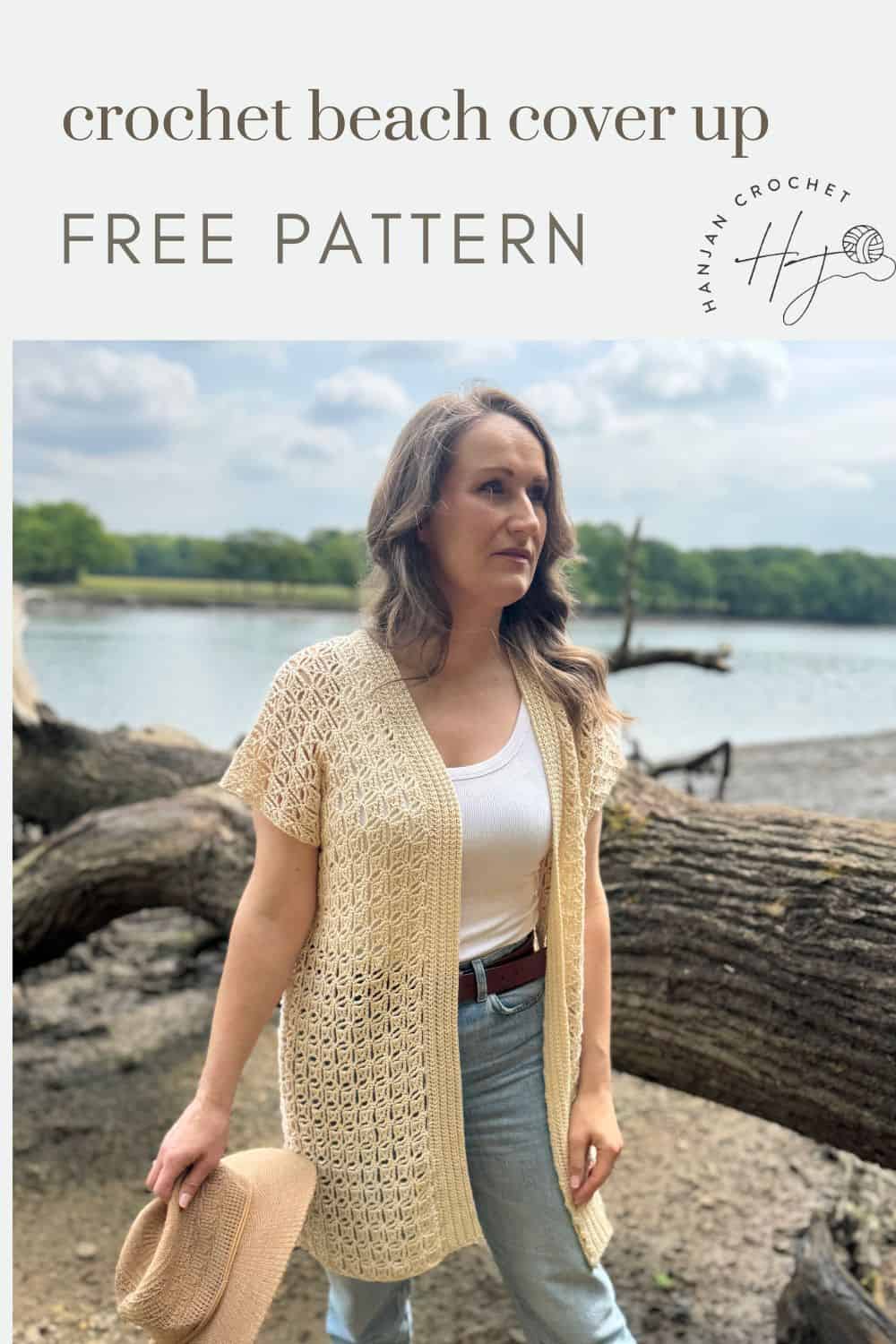 Woman wearing a beige crocheted beach cover up, holding a hat, standing by a lake with trees in the background; text reads "crochet beach cover up FREE PATTERN and summer cardigan crochet pattern.
