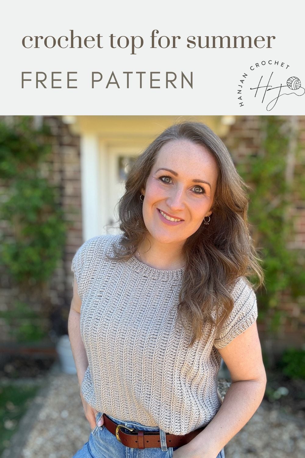 Woman wearing a light beige crocheted top stands outside in front of a brick wall with text reading "crochet summer top pattern, free for you to try.