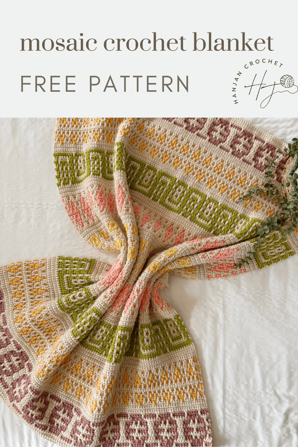 A colorful mosaic crochet blanket with geometric patterns in yellow, pink, green, and white is laid on a white surface. Text reads “mosaic crochet blanket pattern FREE PATTERN.”.