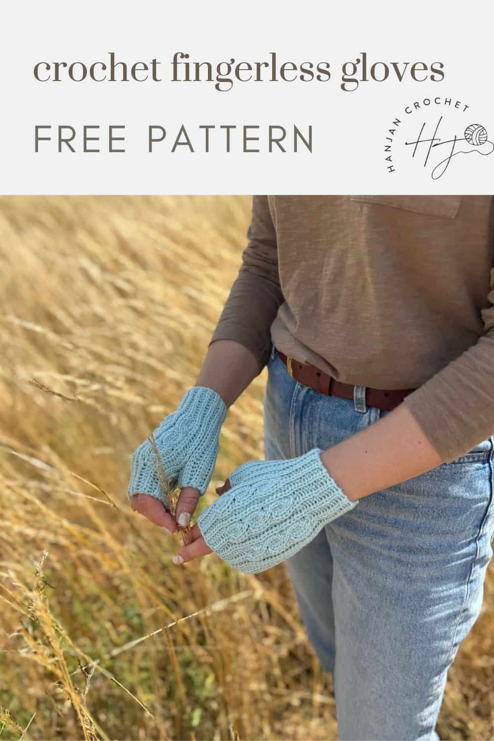 Person wearing blue crochet fingerless gloves stands in a field of tall grass; text reads "crochet fingerless mittens pattern free" with a crochet logo in the corner.