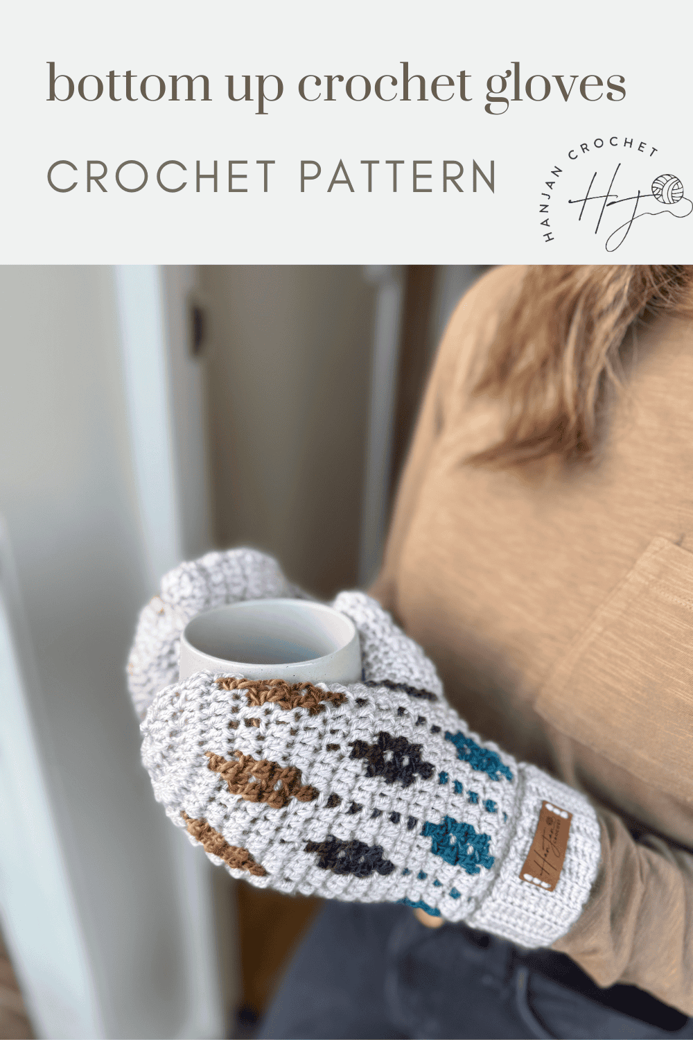 A person wearing white crochet gloves with colored patterns, inspired by a mosaic crochet mittens pattern, holds a mug. Text above reads "bottom up crochet gloves CROCHET PATTERN.