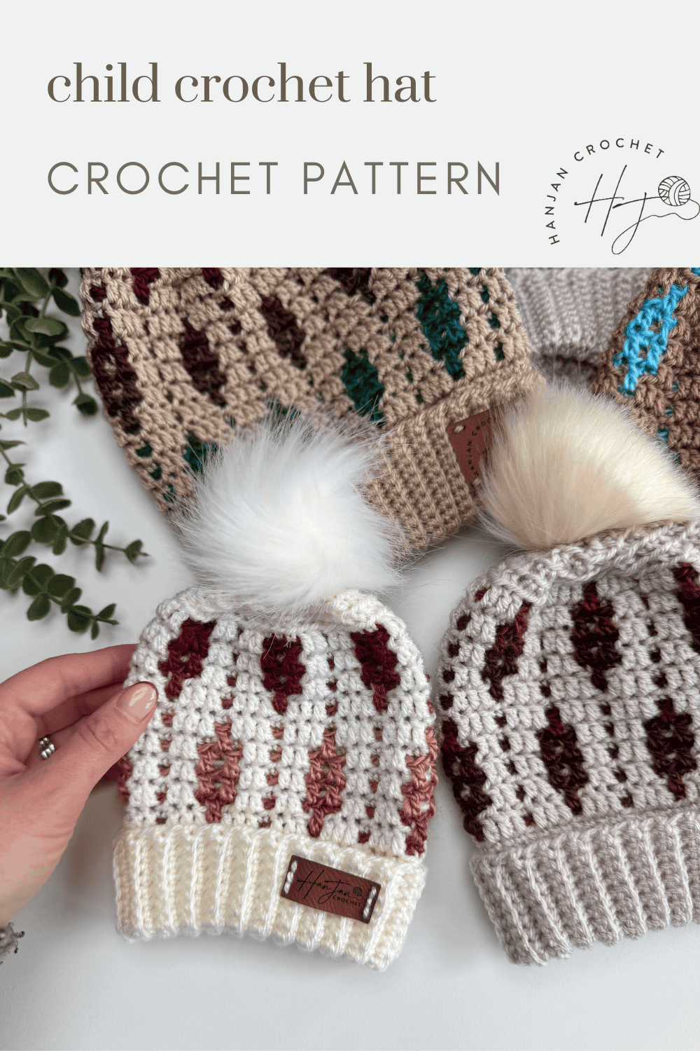 Three crocheted child hats with colorful patterns and faux fur pom-poms are displayed on a white surface, alongside text promoting a mosaic crochet beanie pattern.