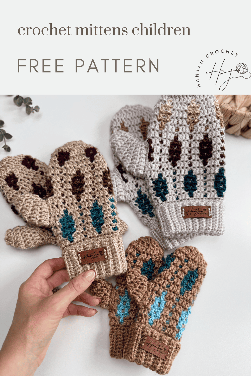 Three pairs of crocheted children's mittens with colorful patterns are displayed on a white surface; a hand holds one mitten. Text reads "mosaic crochet mittens pattern children FREE PATTERN.