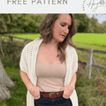 Woman wearing a cream-colored crochet sweater scarf, standing outdoors by a wooden fence, with text reading "crochet sweater scarf pattern free.