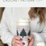 A person in a white sweater holds a travel mug wrapped in a crocheted cozy with green Christmas tree designs. Text reads "Christmas tree mug cozy Crochet Coffee Sleeve Pattern.
