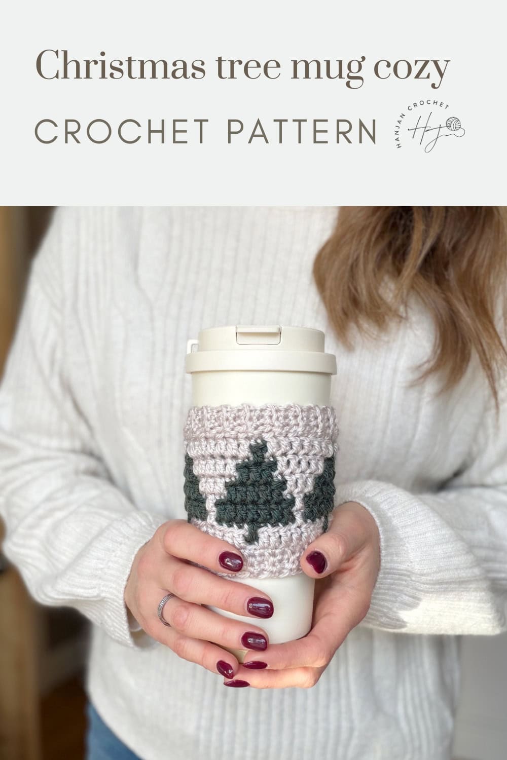 A person in a white sweater holds a travel mug wrapped in a crocheted cozy with green Christmas tree designs. Text reads "Christmas tree mug cozy Crochet Coffee Sleeve Pattern.