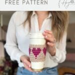 Woman holding a coffee cup wrapped with a pink and beige crochet coffee cozy with heart detail; "crochet coffee cozy free pattern" text above.