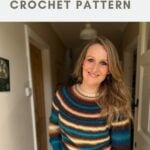 Woman wearing a striped crochet sweater stands in a hallway, smiling at the camera. Text above reads "seamless sweater crochet pattern.
