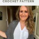 Woman wearing a grey crocheted cardigan over a white shirt, standing indoors; text above reads "one piece cardigan CROCHET PATTERN.