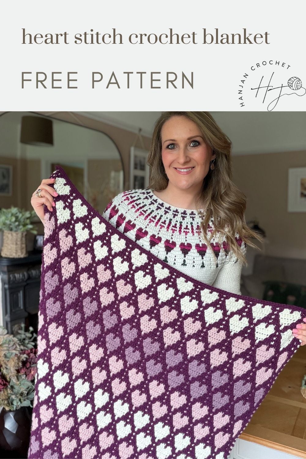 Woman holding a purple and pink heart stitch crochet blanket in a living room, with text overlay advertising a free pattern.