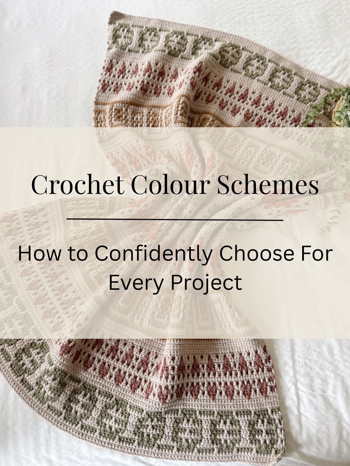 A crocheted blanket with green and red patterns is spread on a white surface. Text overlay reads: "Crochet Colour Schemes: How to Confidently Choose For Every Project"&mdash;explore inspiring crochet colour schemes for all your creations.