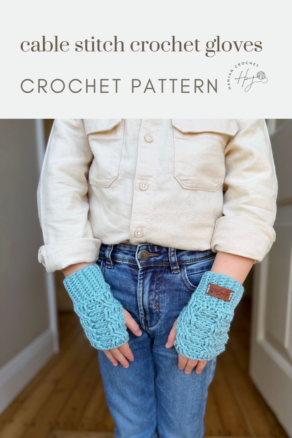 Child wearing light blue, cable stitch crochet wrist warmers stands with hands in pockets; crochet wrist warmers free pattern advertisement appears above.