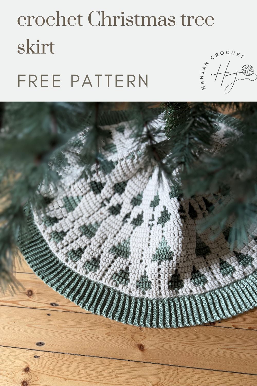 Crocheted Christmas tree skirt with a green and white pattern placed under a tree on a wooden floor; text reads “crochet tree skirt pattern, free pattern.”.