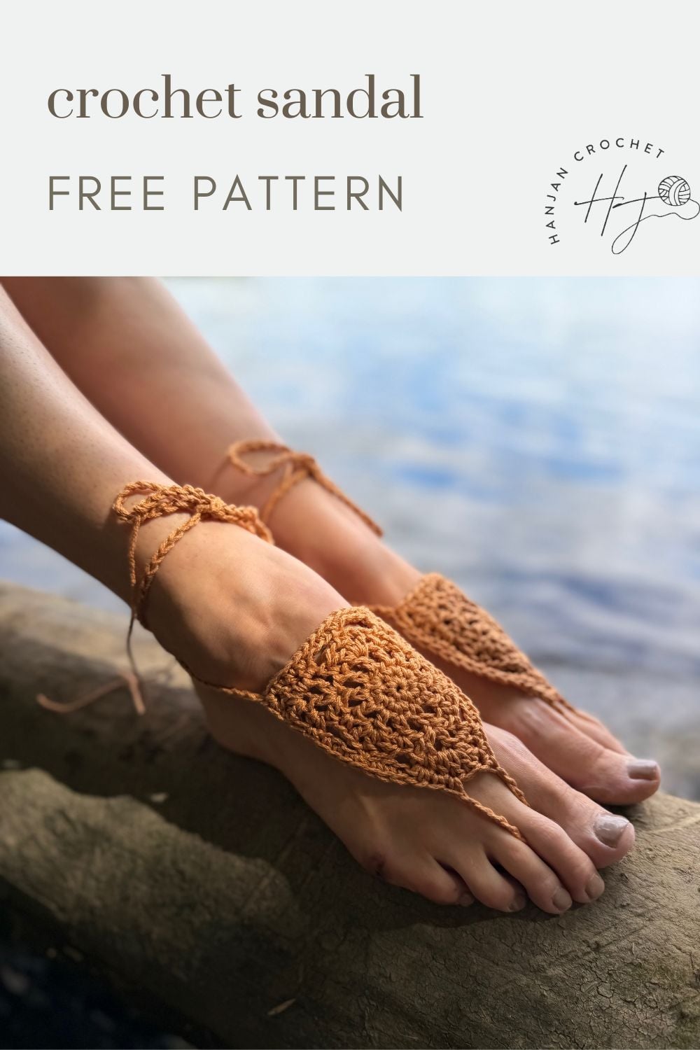 Two bare feet in handmade brown crochet sandals rest on a rock by the water. Text above reads "free barefoot crochet sandals pattern, Hannah Crochet.