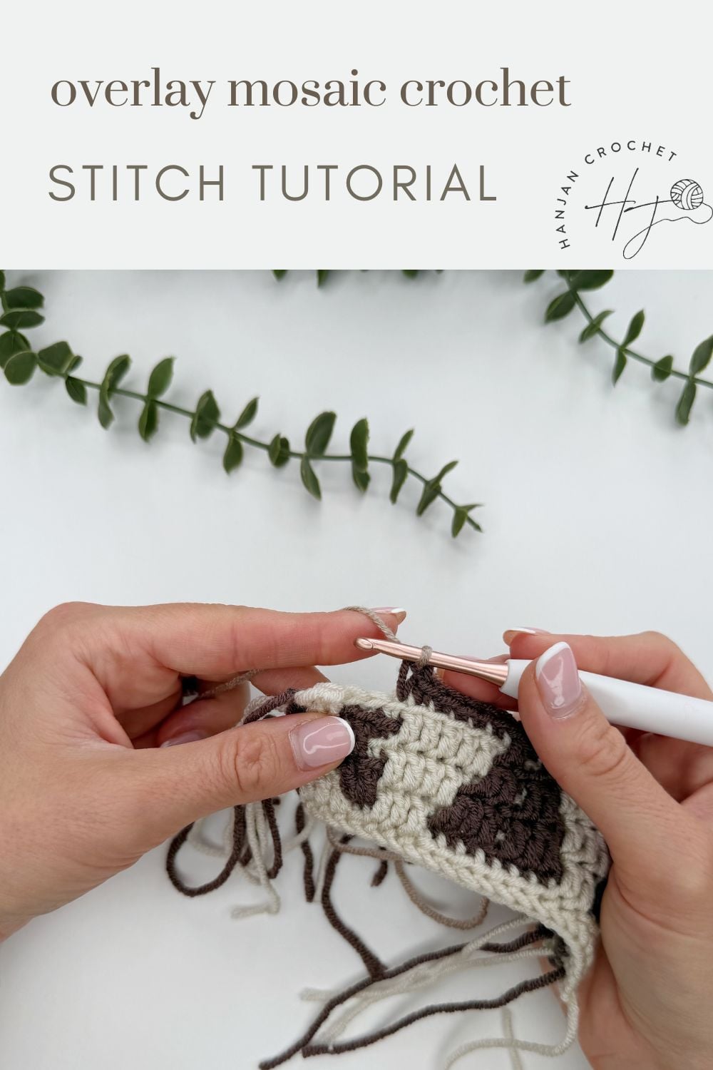 Two hands crocheting a mosaic pattern with cream and brown yarn, next to green leafy stems, under text that reads “overlay mosaic crochet STITCH TUTORIAL.”.